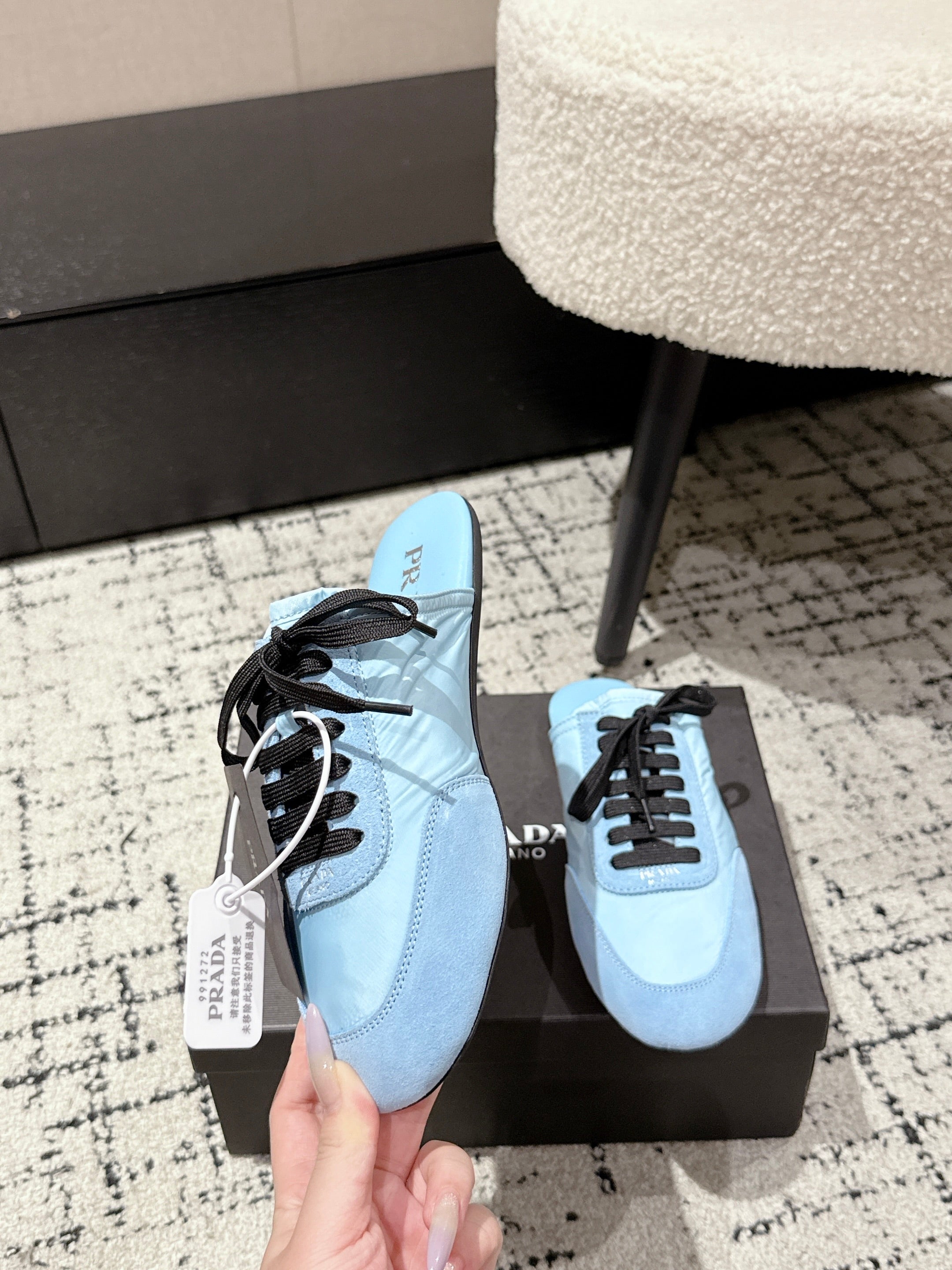 PRADA 25S DEXUN MULE IN LIGHT BLUE SUEDE LEATHER